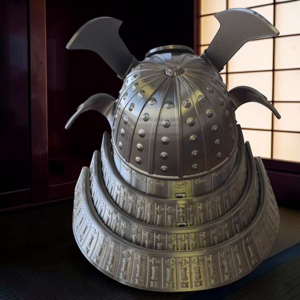 HPHobbies metallic silver Japanese Samurai Kabuto helmet replica with intricate embossed crest and riveted dome design.