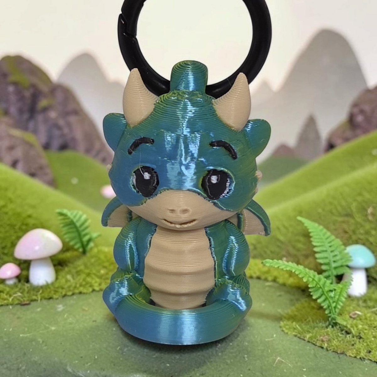 HPHobbies Linklet dragon figurine keychain in blue and tan, featuring a snap-together design for accessories.