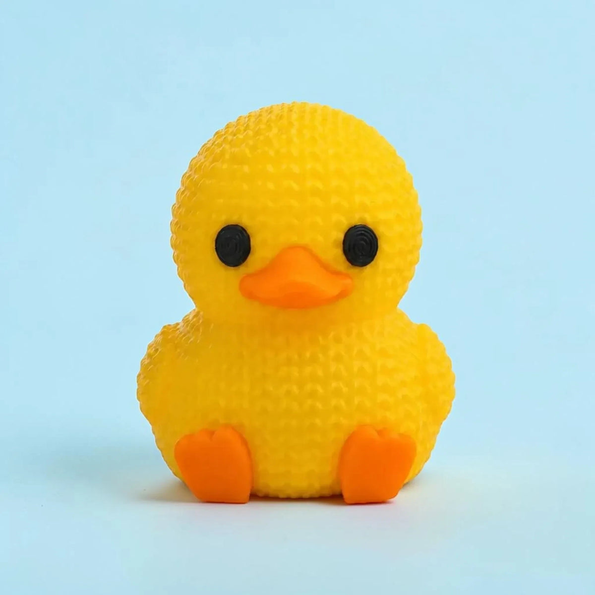 HPHobbies 2.25-inch yellow 3D printed faux knit duck with a crochet-like texture and orange beak and feet.