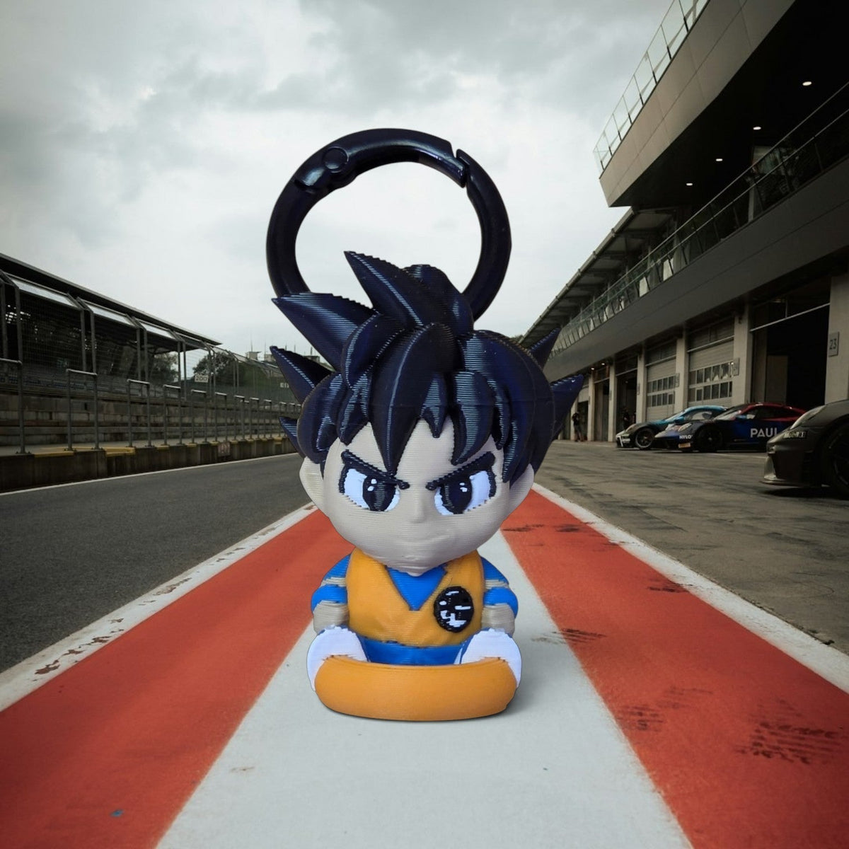 HPHobbies Linklet anime-style figurine keychain with a black snap ring, featuring a spiky-haired character design.